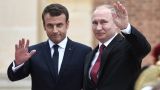 Путин поздравил Эмманюэля Макрона с национальным праздником Франции