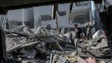 Число жертв удара по лагерю беженцев в секторе Газа выросло до 30 человек