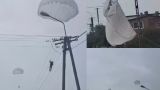 Darwin Award — Polish paratroopers made a mockery of themselves by hanging on power lines