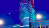 Башня «Лидер Тауэр» осветилась в цвета абхазского флага