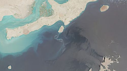 The Strait of Hormuz turns the color of oil